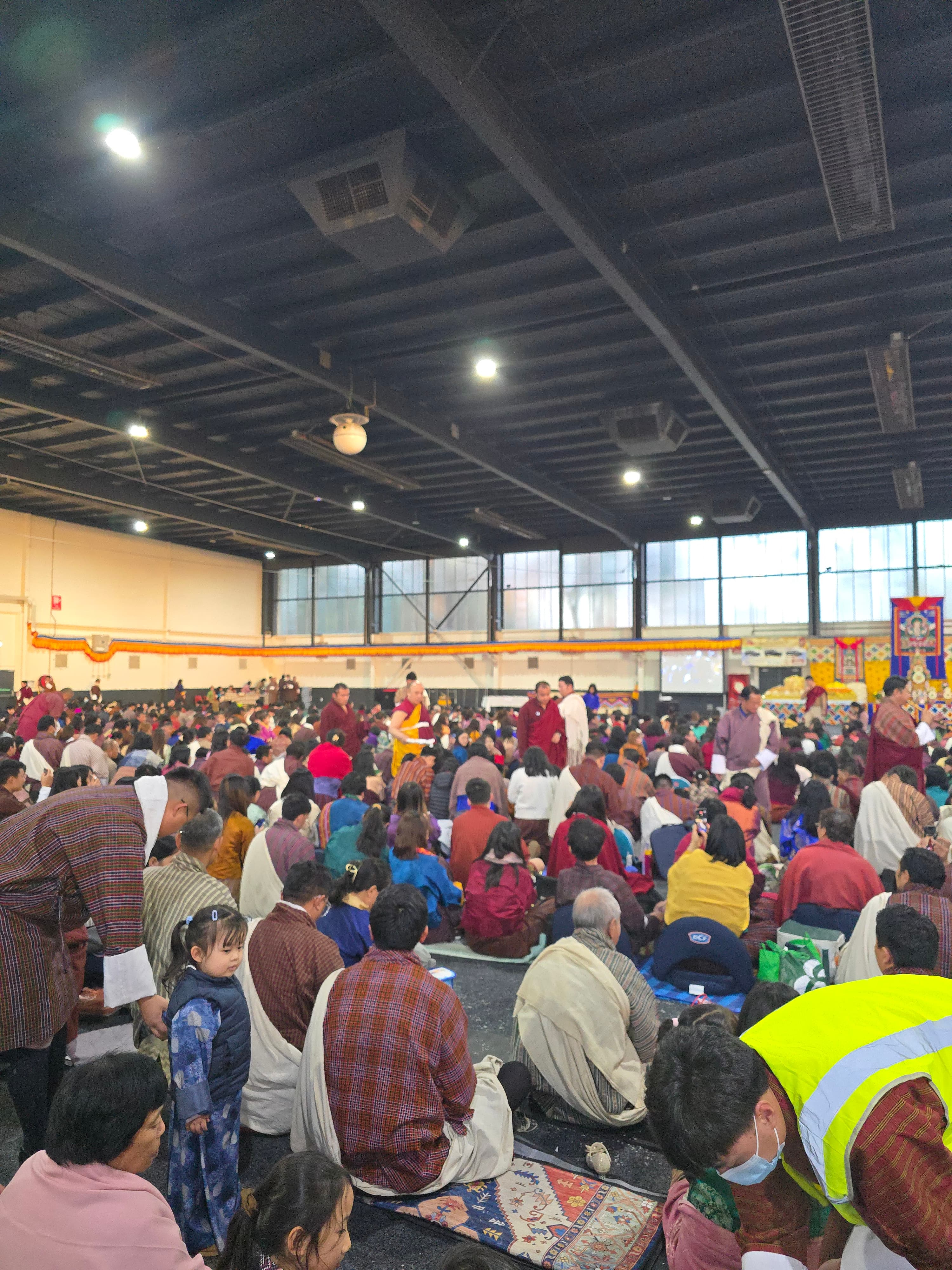 Kyabje Namkhai Nyingpo Rinpoche bestowing empowerment to devotees during the two-day Tshogbum and Public Wang in Canberra